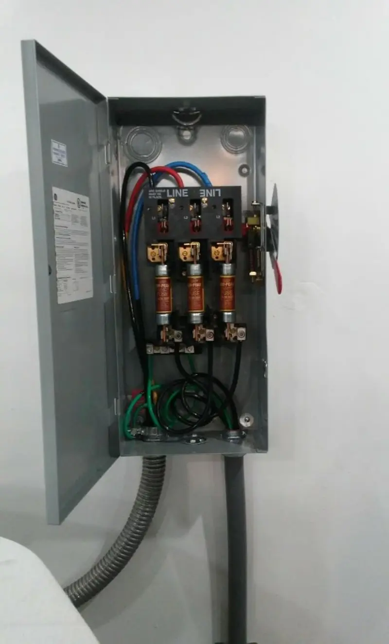 Three-phase disconnect switch installed for Smoke Detector Installation in Robbins